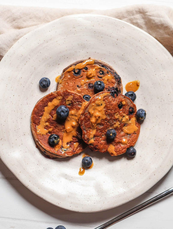 Blueberry pancakes that hit 36g of protein before 9am.
